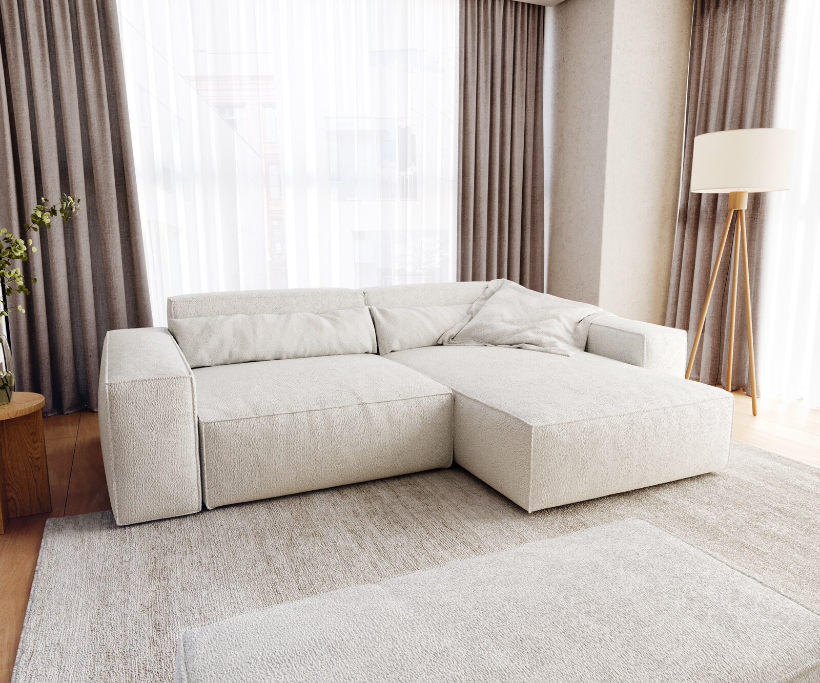 Sofa narożna Sirpio XL 270x170cm bouclé kremowo-biały szezlong z możliwością zmiennego ustawienia z pufem